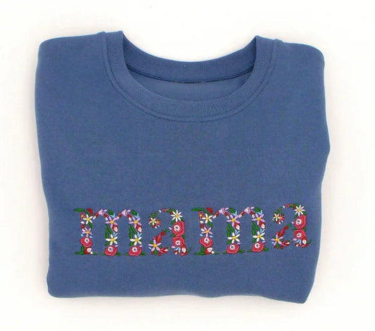 Trui met bloementekst vanconcepts.be