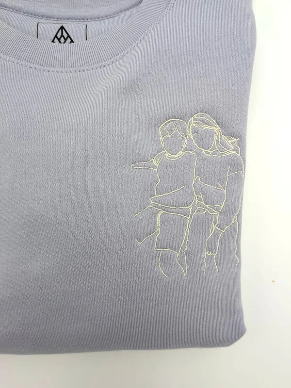 Kindertrui met lijntekening of handgeschreven tekst vanconcepts.be