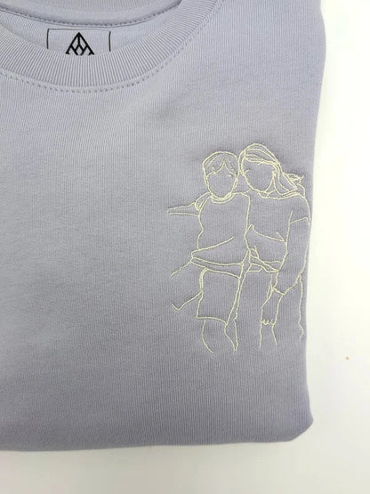 Kindertrui met lijntekening of handgeschreven tekst vanconcepts.be
